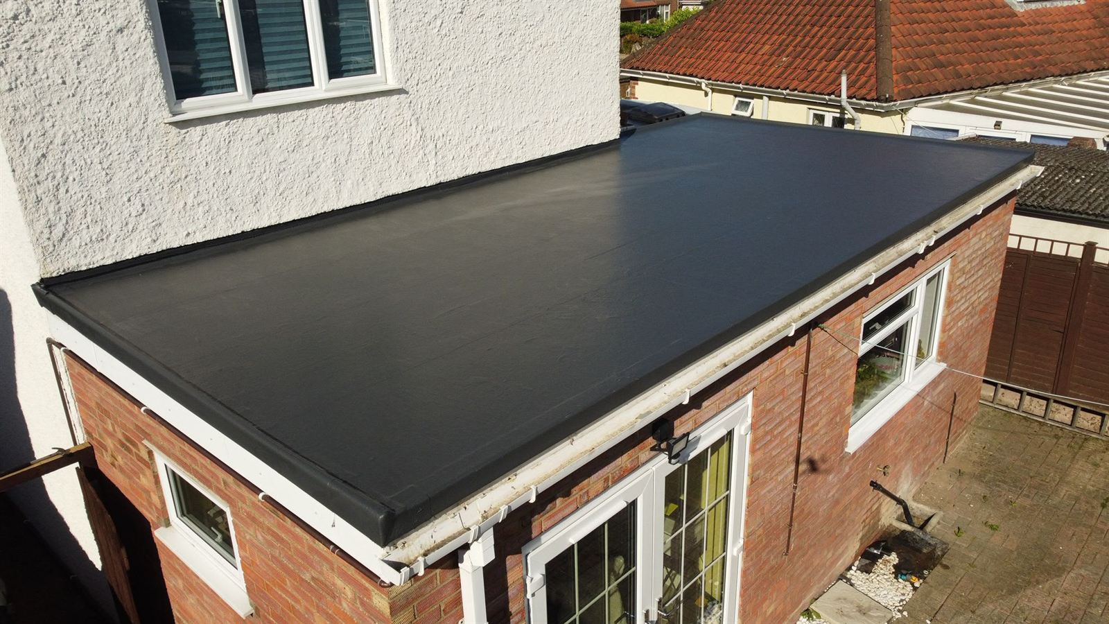 Finished rubber flat roof extension