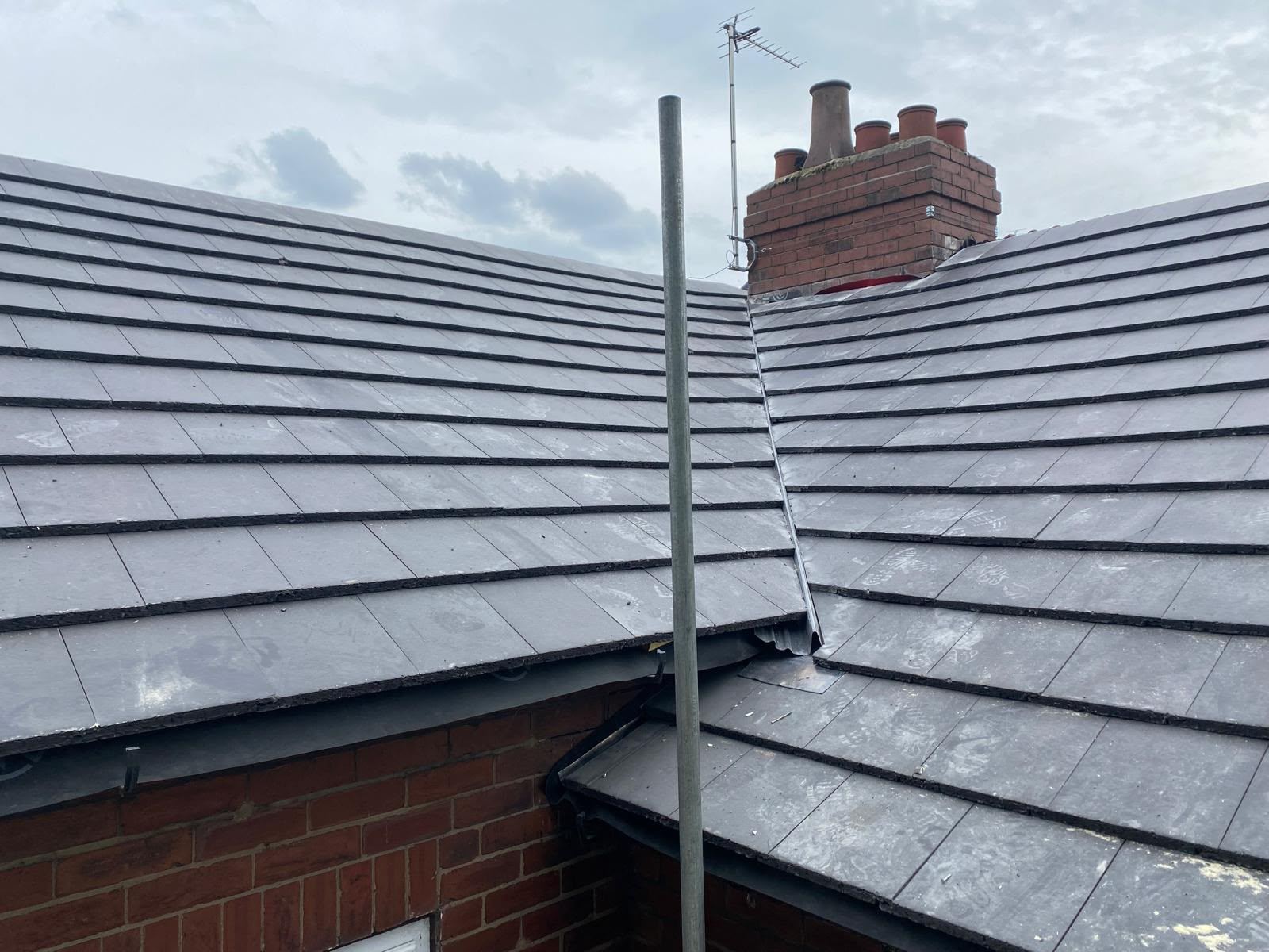 New slate effect tiles around chimney